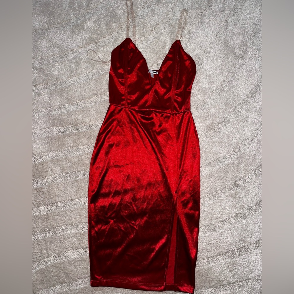 Midi silk red dress with clear straps and a side slit